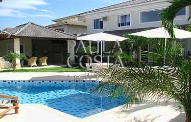 Imagem: A casa em condomínio possui 5 Dormitórios, 5 Banheiros, 5