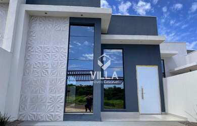 Imagem: A casa possui 3 Dormitórios, 2 Banheiros, 2 Vagas na garagem