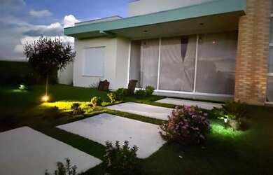 Imagem: A casa possui 3 Dormitórios, 3 Banheiros, 3 Vagas na garagem