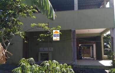 Imagem: A casa possui 2 Dormitórios, 2 Banheiros, 3 Vagas na garagem