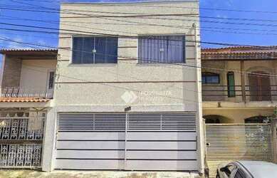 Imagem: A casa possui 3 Dormitórios, 2 Banheiros, 2 Vagas na garagem