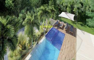 Imagem: A casa em condomínio possui 4 Dormitórios, 5 Banheiros, 4