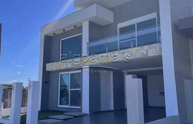 Imagem: A casa possui 5 Dormitórios, 4 Banheiros, 2 Vagas na garagem