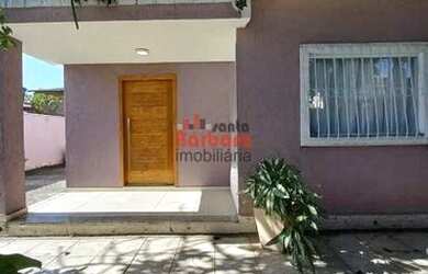 Imagem: A casa possui 2 Dormitórios, 3 Banheiros, 3 Vagas na garagem