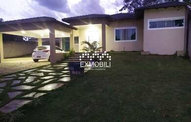 Imagem: A casa possui 5 Dormitórios, 3 Banheiros, 5 Vagas na garagem