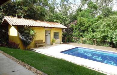 Imagem: A casa em condomínio possui 5 Dormitórios, 5 Banheiros, 4