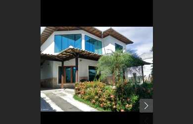 Imagem: A casa possui 3 Dormitórios, 2 Banheiros, 3 Vagas na garagem