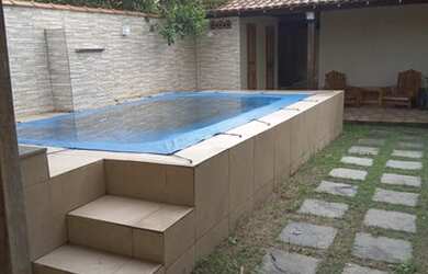 Imagem: A casa possui 3 Dormitórios, 3 Banheiros, 1 Vaga na garagem