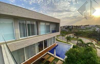 Imagem: A casa em condomínio possui 4 Dormitórios, 5 Banheiros, 3