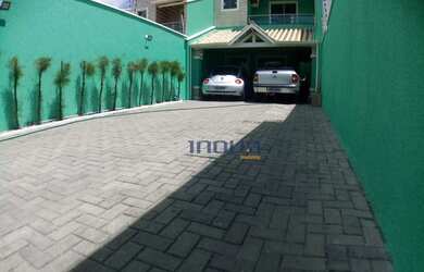 Imagem: A casa possui 4 Dormitórios, 4 Banheiros, 4 Vagas na garagem