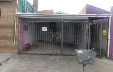 Imagem: A casa possui 2 Dormitórios, 2 Banheiros, 1 Vaga na garagem