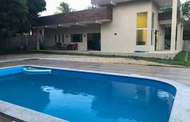 Imagem: A casa possui 5 Dormitórios, 3 Banheiros, 5 Vagas na garagem