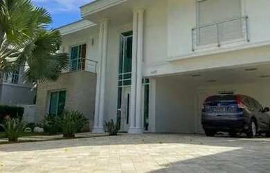 Imagem: A casa possui 5 Dormitórios, 5 Banheiros, 4 Vagas na garagem