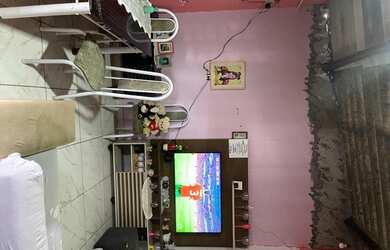 Imagem: A casa possui 2 Dormitórios, 1 Banheiro, 1 Vaga na garagem