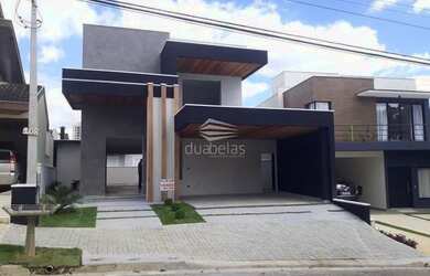 Imagem: A casa em condomínio possui 5 Dormitórios, 3 Banheiros, 2