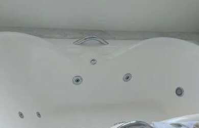 Imagem: A casa possui 4 Dormitórios, 5 Banheiros, 2 Vagas na garagem