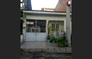 Imagem: A casa possui 2 Dormitórios, 1 Banheiro, 1 Vaga na garagem