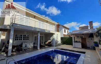 Imagem: A casa em condomínio possui 4 Dormitórios, 5 Banheiros, 4