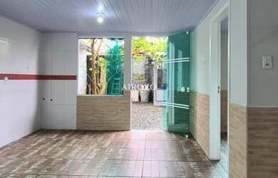 Imagem: A casa possui 3 Dormitórios, 3 Banheiros, 4 Vagas na garagem