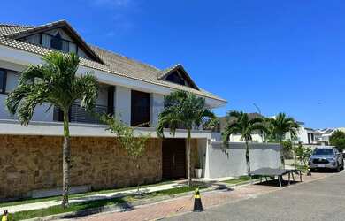 Imagem: A casa em condomínio possui 5 Dormitórios, 5 Banheiros, 4