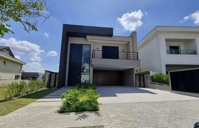 Imagem: A casa em condomínio possui 4 Dormitórios, 5 Banheiros, 5