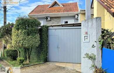 Imagem: A casa possui 3 Dormitórios, 4 Banheiros, 3 Vagas na garagem