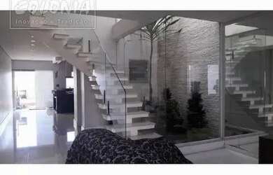 Imagem: A casa possui 3 Dormitórios, 5 Banheiros, 5 Vagas na garagem