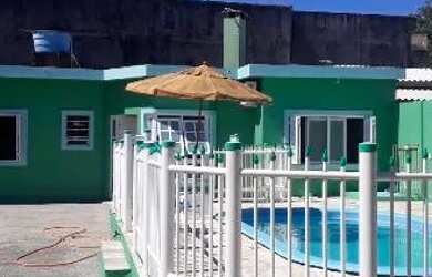 Imagem: A casa possui 2 Dormitórios, 2 Banheiros, 5 Vagas na garagem