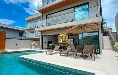 Imagem 1: CASA COM 4 SUITES E UMA VISTA INCRIVEL EM CONDOMINIO FECHADO