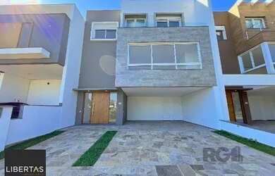 Imagem: A casa em condomínio possui 3 Dormitórios, 3 Banheiros, 2