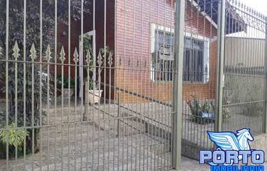 Imagem: A casa possui 3 Dormitórios, 4 Banheiros, 2 Vagas na garagem