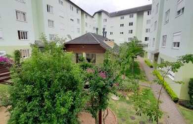 Imagem: O apartamento possui 2 Dormitórios, 1 Banheiro, 1 Vaga na garagem