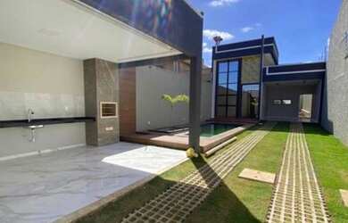 Imagem: A casa possui 3 Dormitórios, 3 Banheiros, 3 Vagas na garagem