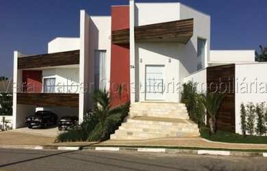 Imagem: A casa em condomínio possui 4 Dormitórios, 5 Banheiros, 4