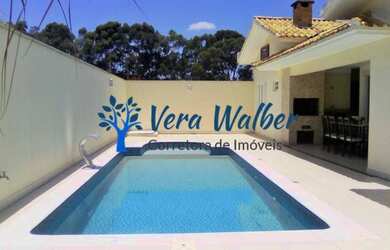 Imagem: A casa em condomínio possui 3 Dormitórios, 4 Banheiros, 4