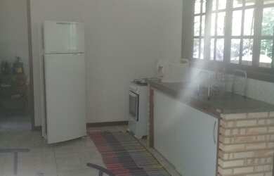 Imagem: A casa possui 2 Dormitórios, 3 Vagas na garagem e está localizado