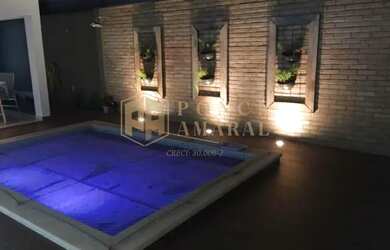 Imagem: A casa possui 3 Dormitórios, 4 Banheiros, 4 Vagas na garagem