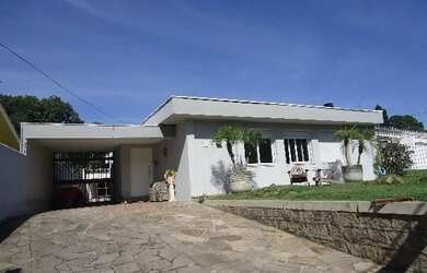 Imagem: A casa em condomínio possui 4 Dormitórios, 4 Banheiros, 5