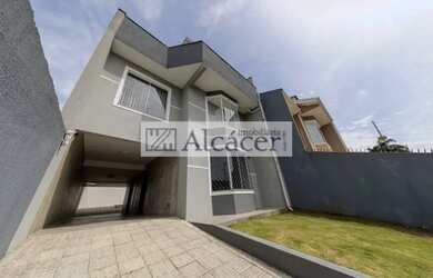 Imagem: A casa possui 3 Dormitórios, 3 Banheiros, 5 Vagas na garagem