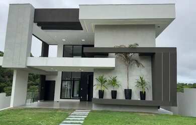 Imagem: A casa em condomínio possui 4 Dormitórios, 5 Banheiros, 5