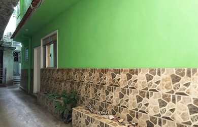 Imagem: A casa possui 3 Dormitórios, 2 Banheiros e está localizado