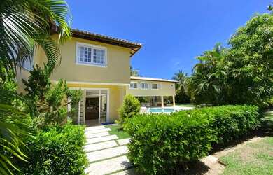 Imagem: A casa possui 5 Dormitórios, 5 Banheiros, 4 Vagas na garagem