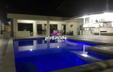 Imagem: A casa possui 3 Dormitórios, 2 Banheiros, 5 Vagas na garagem