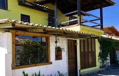 Imagem: A casa possui 5 Dormitórios, 4 Banheiros, 5 Vagas na garagem