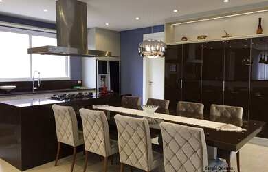 Imagem: A casa possui 5 Dormitórios, 5 Banheiros, 5 Vagas na garagem