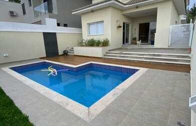 Imagem: A casa em condomínio possui 3 Dormitórios, 3 Banheiros, 4