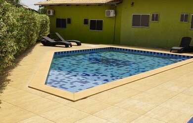 Imagem: A casa possui 4 Dormitórios, 4 Banheiros, 1 Vaga na garagem