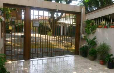 Imagem: A casa possui 3 Dormitórios, 3 Banheiros, 1 Vaga na garagem