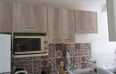 Imagem: O apartamento possui 2 Dormitórios, 1 Banheiro, 1 Vaga na garagem