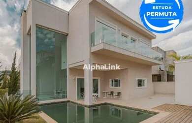 Imagem: A casa em condomínio possui 4 Dormitórios, 5 Banheiros, 5